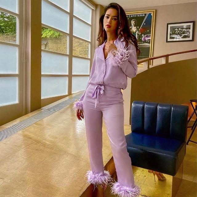 Zweiteiliges Set mit Federn 2