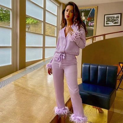 Zweiteiliges Set mit Federn 2