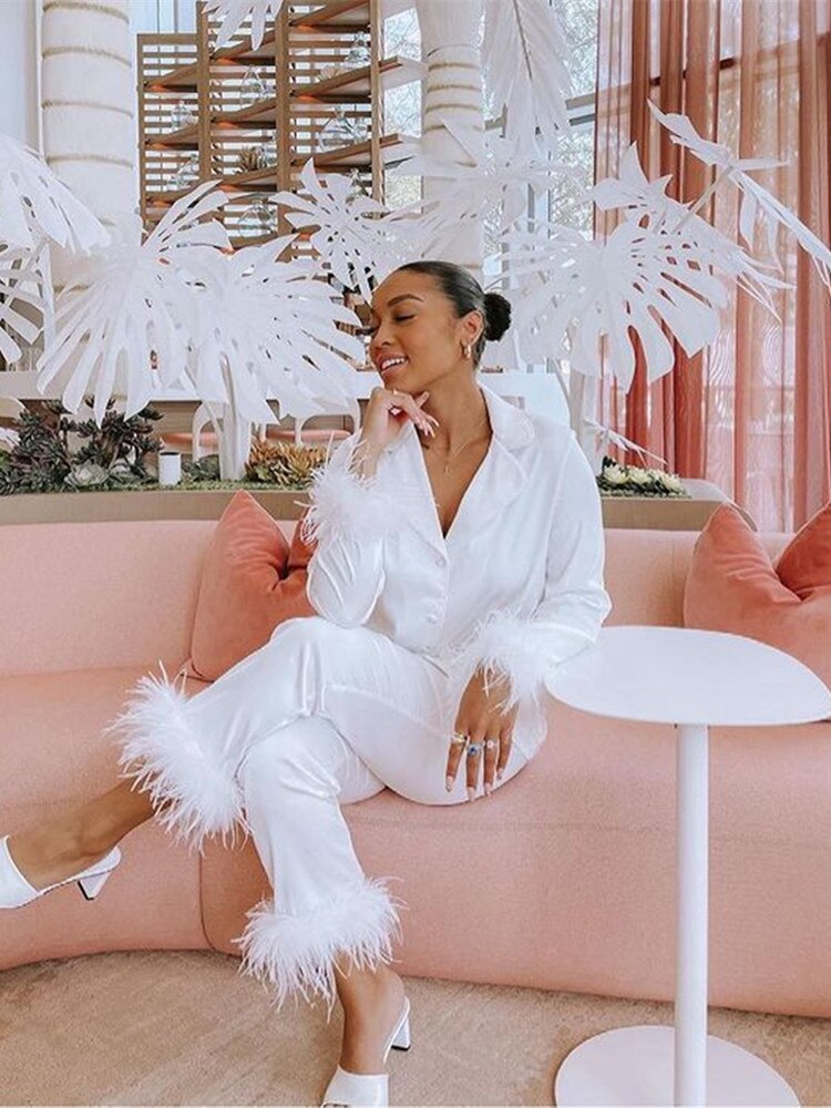 Zweiteiliges Set mit Federn 5